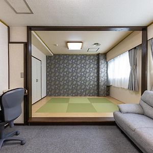 Kamer met Twee Aparte Bedden in Japanse Stijl